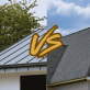 Asphalt Shingles vs. Metal Roofing Comparing Cost, Lifespan, and ROI